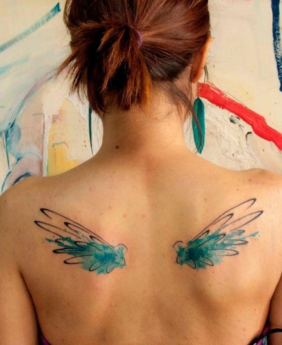 people-with-watercolor-paintings-tattooed- their-bodies
